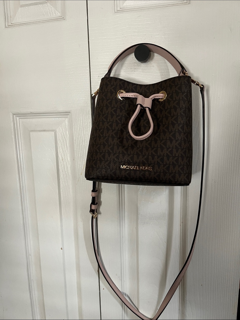Michael Kors Brown Monogram Bucket Crossbody with Pink Trim